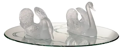 Lalique, Miroir Cygnes Centerpiece, circa 1950, two frosted and clear etched glass swans resting on an oval mirror plateau etched to resemble rippling water