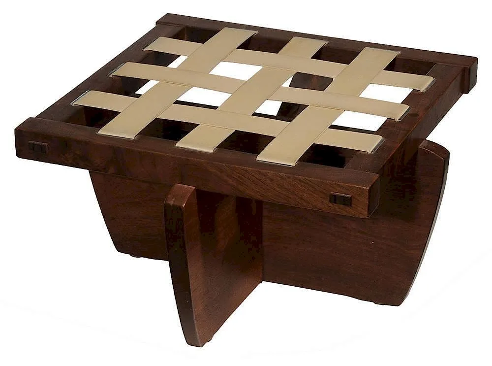 Walnut Footstool by George Nakashima, 1984, square top with webbing over cross-form figured walnut base, sold Nov 2014