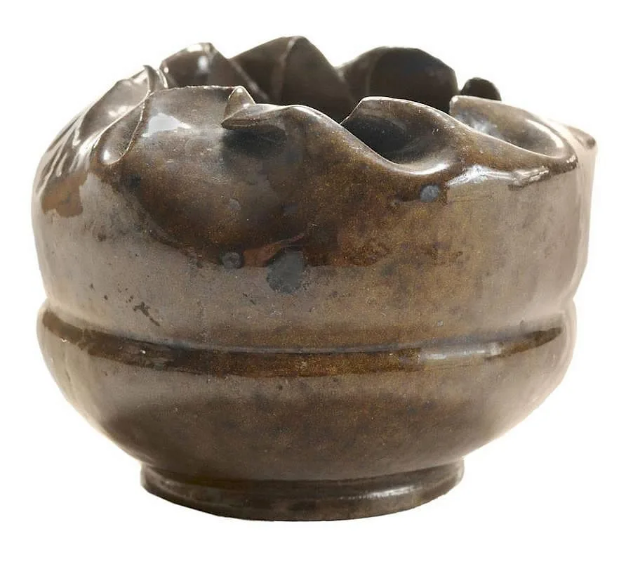 Untitled by George E. Ohr, 1890, redware with mottled brown glaze, sold Sep 2014