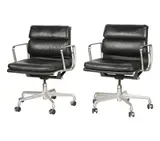 Charles and Ray Eames, Two Soft Pad Management Chairs, black leather