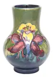 William Moorcroft, COLUMBINE PATTERN GLAZED ART POTTERY VASE, English glazed art pottery vase