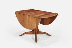 Sam Maloof, Drop-Leaf Dining Table, 1982, Sculpted walnut