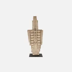 Mounted Architectural Element by Frank Lloyd Wright, 1919, painted steel base. 39" H x 16" W x 11.75" D, sold Sep 2023