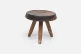 Low 'Berger' Stool by Charlotte Perriand, 1953, designed 1953 Stained ash, sold Jun 2023