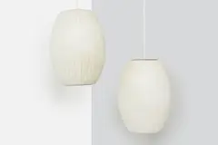George Nelson, + Associates, 'Bubble' Pendant Lamps (2), 1960s, Plastic polymer over steel frame
