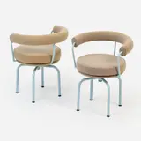 Charlotte Perriand, for Cassina Pair of LC7 Swivel Chairs (ca. 1980s)
