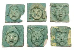 Pewabic, Glazed Ceramic Theatre Mask Tiles, from the Lobby of the National Theatre, Detroit, Ca. 1910, 6 PC, Ca. 1910, Six relief theatre mask tiles with a teal glaze