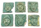Pewabic, Glazed Ceramic Theatre Mask Tiles, from the Lobby of the National Theatre, Detroit, Ca. 1910, 6 PC, Ca. 1910, Six relief theatre mask tiles with a teal glaze