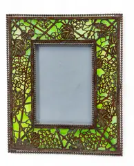 'Grapevine' Etched Metal & Favrile Glass 947 Photo Frame, Early 20th C. by Tiffany Studios, sold Jun 2025