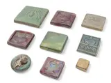 Pewabic, Glazed Ceramic Tiles, Feat. Ira & Ella Peters & Pewabic Studio Artists, 20th C., 1993, one Historic Indian Village 1977 glazed tile by Ira & Ella Peters (H 3.75" x W 4")