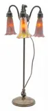 Adjustable Three-Light Lily Lamp, Depth 7.25" by Tiffany Studios, 2000, and the Tiffany Glass & Decorating Co. monogram to the underside, sold Dec 2024