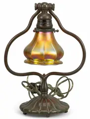 Tiffany Studios, Lamp, patinated bronze and glass shade