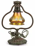 Tiffany Studios, Lamp, patinated bronze and glass shade