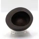 Isamu Noguchi, OOI KOJO, A black enameled cast iron ashtray