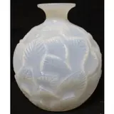 Ormeaux by René Lalique, An opalescent glass vase, sold May 2023