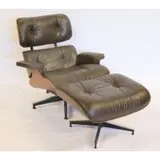 Charles Eames, Midcentury Rosewood Lounge Chair, In brown leather signed with Herman Miller label and dated