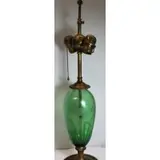 Favrille Etched Green Glass Lamp by Tiffany Studios, 1880, Lamp signed on the bronze base" LCT Favrile" and "#13564".Etched with fish and reeds, sold Sep 2017