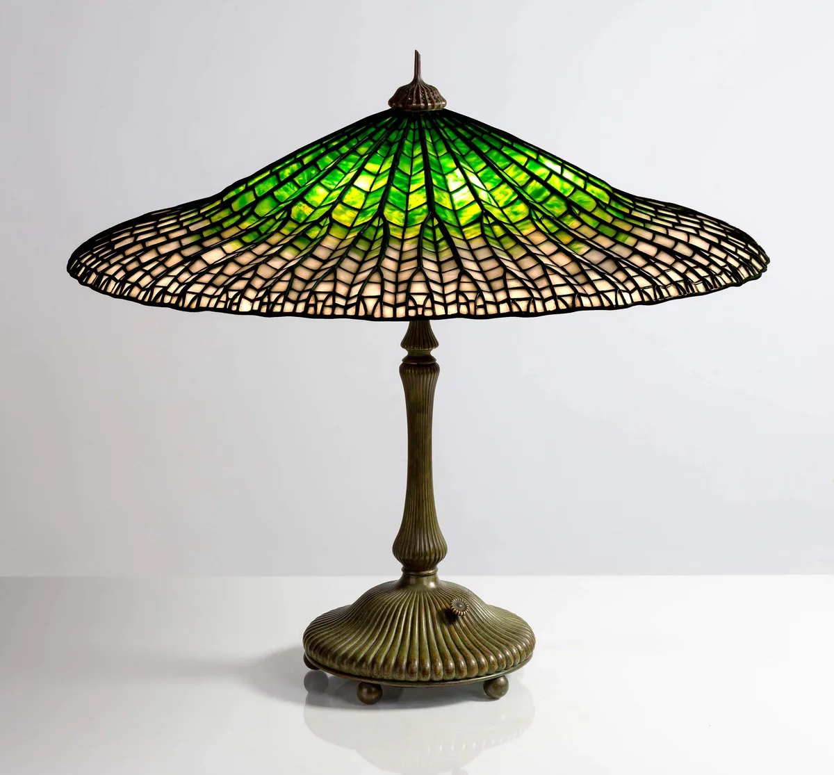 Lotus by Tiffany Studios, 1900, Leaded glass and patinaed bronze, sold Mar 2023