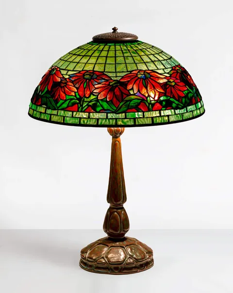 Tiffany Studios, Poinsettia Table Lamp, circa 1910, leaded glass and patinaed bronze