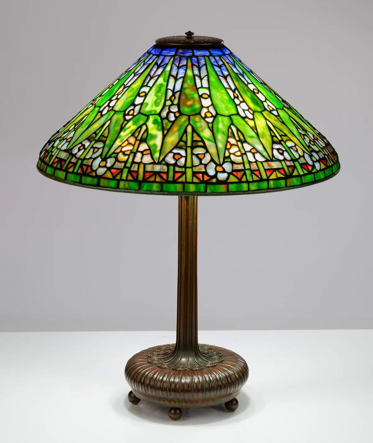 Arrowroot Lamp by Tiffany Studios, leaded glass and patinaed bronze, sold Mar 2025