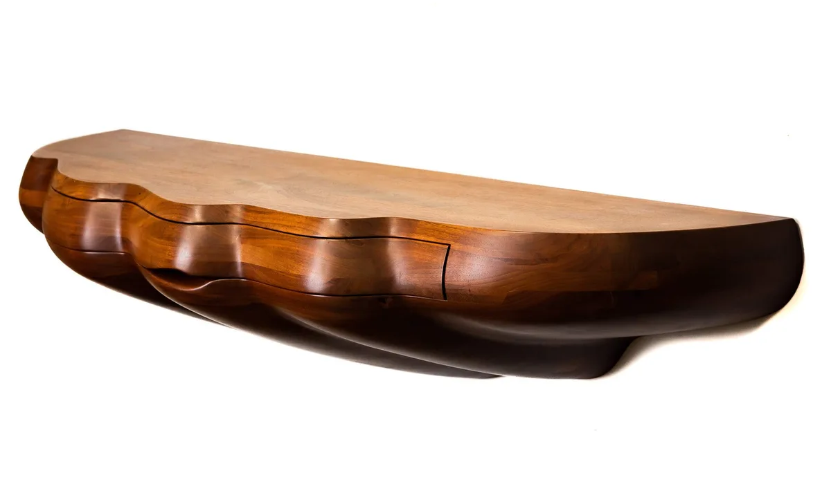 Cloud Form Sideboard by Wendell Castle, 1979, stacked and laminated carved walnut, sold Sep 2022