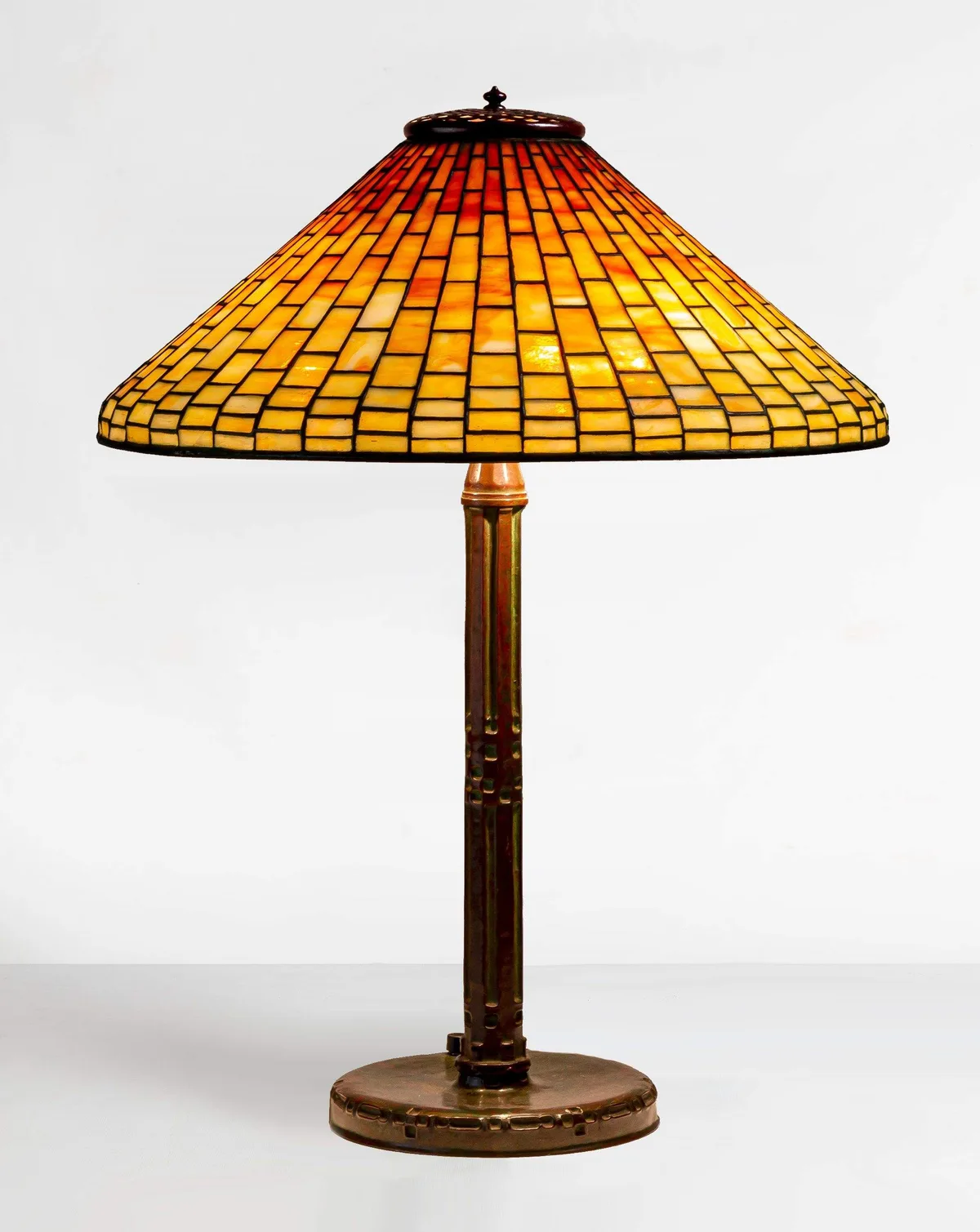Geometric Table Lamp by Tiffany Studios, circa 1910, leaded glass and patinaed bronze, sold Sep 2022