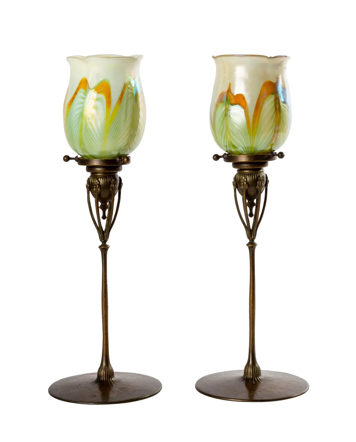 Candlesticks with Pulled Feather Shades by Tiffany Studios, circa 1900, Patinaed bronze, sold Mar 2023