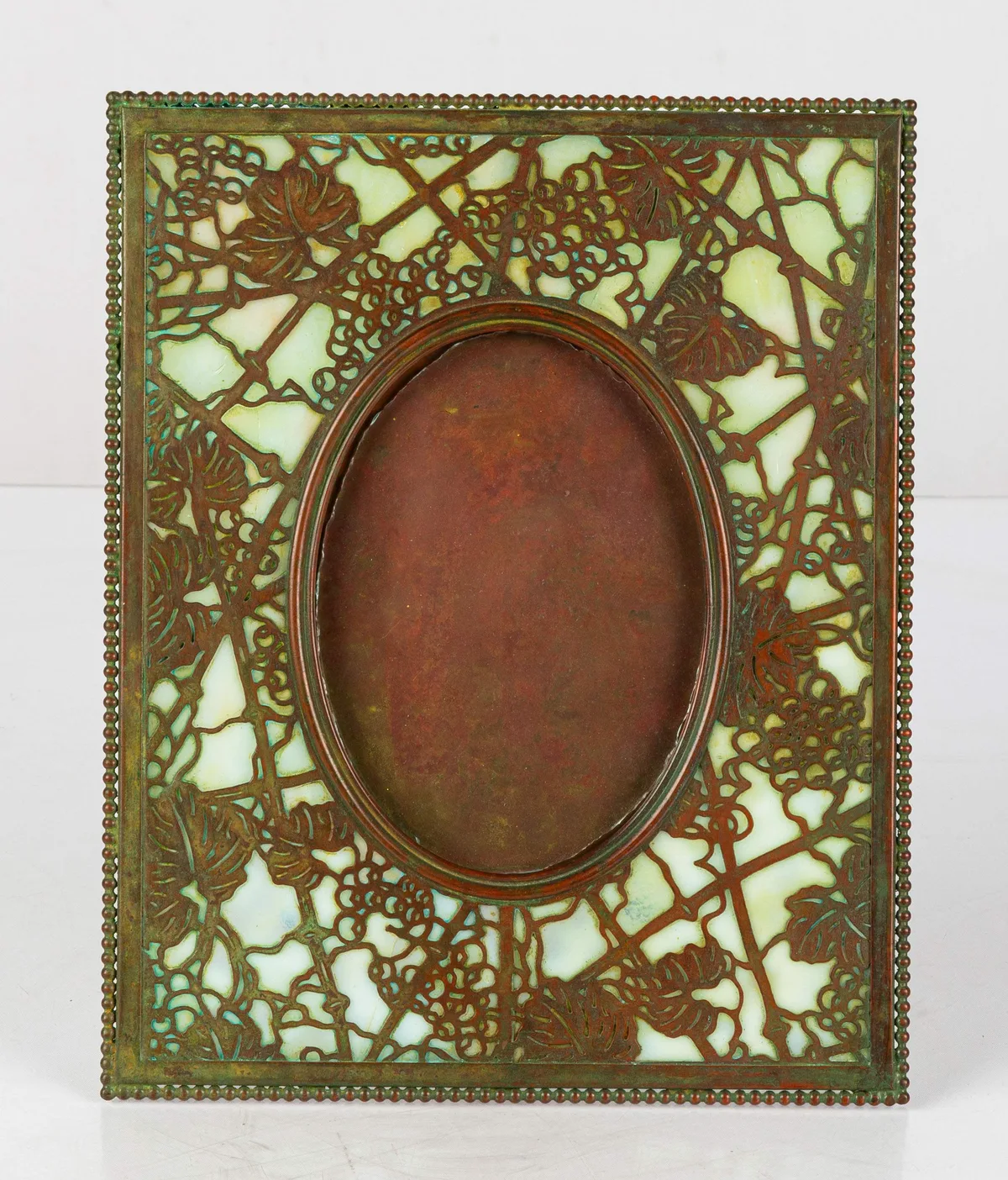 Grapevine Picture Frame by Tiffany Studios, 1988, favrile glass, sold Sep 2024
