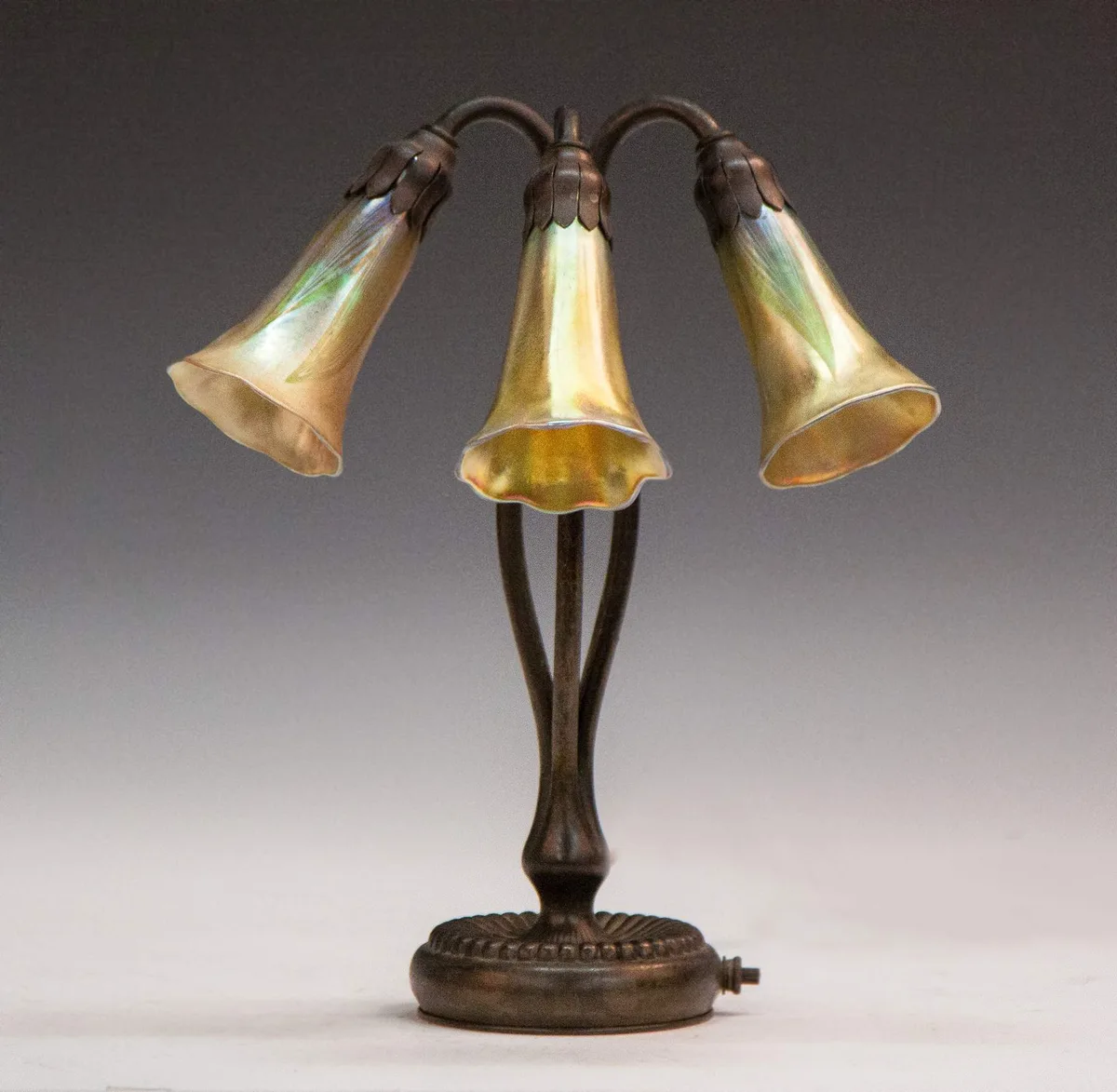 Three Light Table Lamp by Tiffany Studios, sold Sep 2015