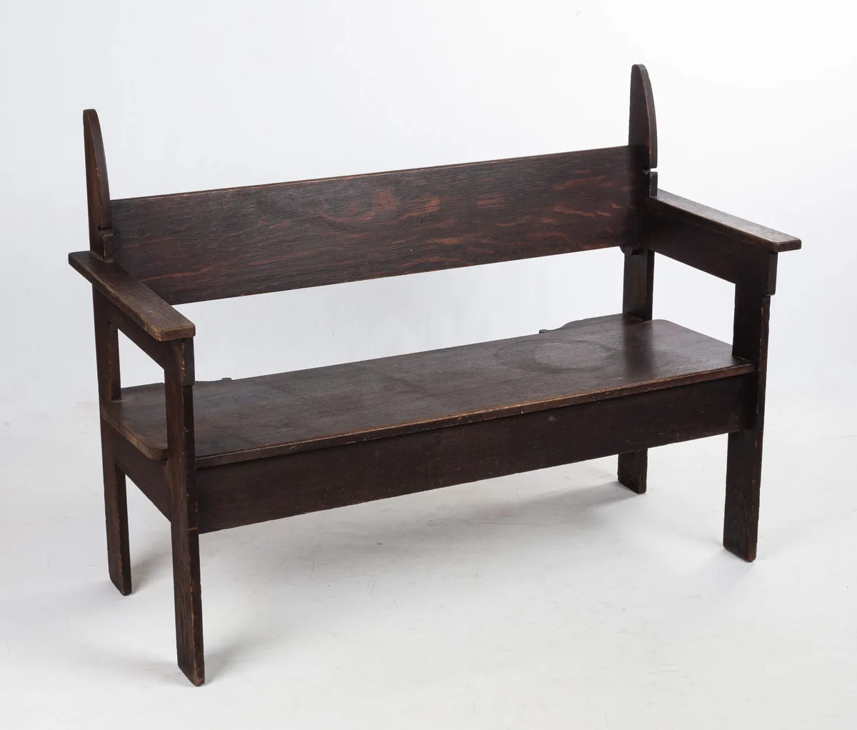Bench by Charles Rohlfs, 1903, Carved quarter-sawn oak, sold Nov 2024