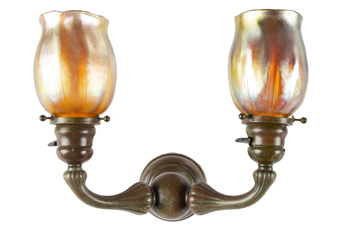 2 Light Sconce by Tiffany Studios, patinaed bronze and favrile glass, sold Sep 2022