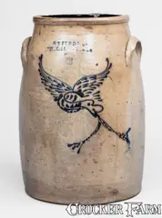 E. T. Ford & Co., Rare E. T. FORD & CO. / MECHANICVILLE, NY Stoneware Churn w/ Eagle Decoration, third quarter 19th century, Stoneware