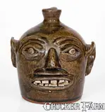 H.F. Reinhardt, Rare H.F. REINHARDT / VALE, N.C. Alkaline-Glazed Stoneware Face Jug, second quarter 20th century, Alkaline-glazed stoneware