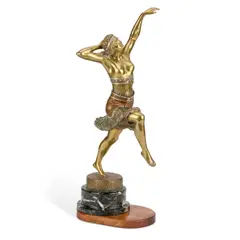An Art Deco Bronze Figure Of A Dancing Girl, Circa 1925 by Henri Fugere, marble base with an oak plinth, sold May 2025