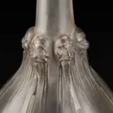 René Lalique (French, 1860-1945), 'Six Tétes', An Early Frosted Glass Decanter And Stopper Designed 1914 by René Lalique, glass, sold Jan 2025