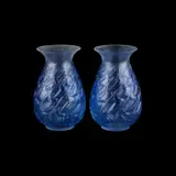 René Lalique (French, 1860-1945), 'Canards', A Pair Of Vases Designed 1931 by René Lalique, glass with blue staining, stencilled R, sold Jan 2025