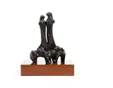 Couple on a Bench by Martin Qgibinsizi Tose, bronze, mounted on a wooden base, sold Jun 2017