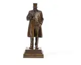 Anton van Wouw, Kruger on the Station, bronze with a brown patina, mounted on a wooden base