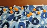 Diamond Bozas, Oranges on Blue Cloth, oil on board