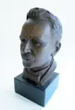 Coert Laurens Steynberg, Bust of Jan Cilliers, bronze with a dark brown patina, mounted on a slate base
