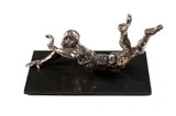 Stella Shawzin, Figure in Movement on Stomach, bronze, on a marble base