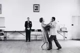 David Goldblatt, Dancing-master Ted van Rensburg watches two of his ballroom pupils, swinging to the music of a recording of Victor Sylvester and his Orchestra, in the hall of the Memorable Order of Tin Hats, at the o