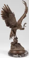 Attacking Eagle by Jules Moigniez, Bronze with brown patina and on polished stepped marble plinth, sold Jun 2020