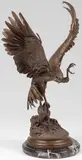 Jules Moigniez, Attacking Eagle, Bronze with brown patina and on polished stepped marble plinth