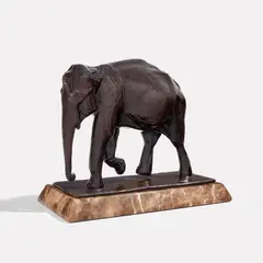 Rembrandt Bugatti, "Petit Éléphant en marche", conceived circa 1912, Patinated bronze, marble