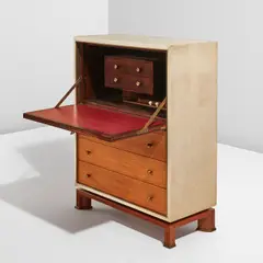Paul Dupré-Lafon, Secrétaire à abattant, 1940s, Oak, oak-veneered wood, parchment, brass. The interior fitted with macassar ebony-veneered wood, leather, ivorine