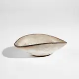 Lucie Rie, Oval low bowl, circa 1978, Stoneware, mixed glazes and a dark manganese rim
