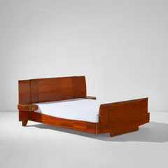 Bed, model no. 894b NR by Émile-Jacques Ruhlmann, 1932, Kingwood-veneered oak, bronze, glass, offered Jun 2022