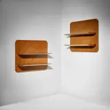 Pair of wall-mounted shelves by Gio Ponti, circa 1951, Oak-veneered wood, painted wood, offered Jun 2022