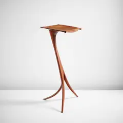 Dictionary stand by Wendell Castle, 1976, Stack-laminated American black walnut, sold Jun 2022